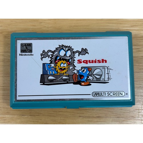 Nintendo game watch squish - &,